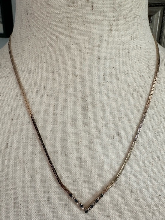 Avon Jewelry - vintage Avon herringbone Gold Tone chevron necklace Amethyst/clear stones 1980s